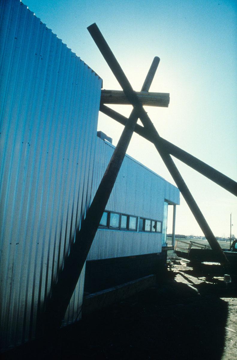 Sinte Gleska University, South Dakota. Tipi Poles Structure On South Face Of Hexagon Building